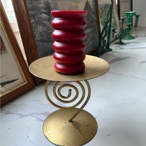 vintage golden-colored metal spiral candlestick holder
